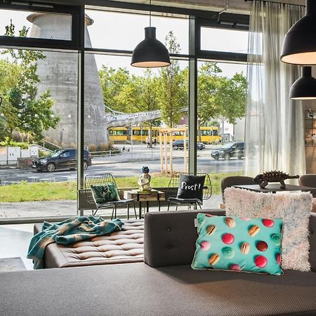 Отель Moxy Stuttgart Feuerbach Экстерьер фото